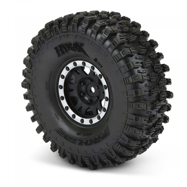 Proline Hyrax 1.9" G8 Rock Terrain TruckTires Mounted on Impulse Black Plastic Internal Bead-Loc Wheels - Kopie